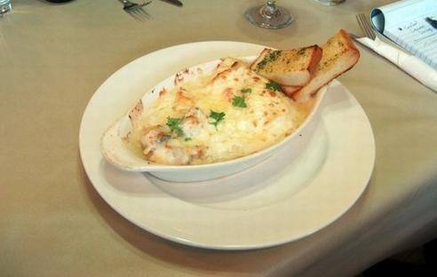 الأرز الإيطالي بالمأكولات البحرية  ‎‎